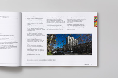 Page 20–21,  Health literacy in social housing (Resident Voice Report). Image showing a page spread with an exterior photograph of social housing in South Melbourne, taken by Nikki M Group.