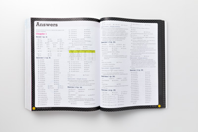 Photograph of a page spread from the student book showing the answers.