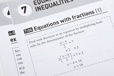 Photo showing part of a homework sheet, looking at the design of a typeset equation.